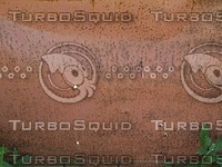 pitted reddish metal.jpg