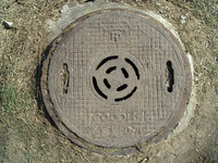 old rusty shaft lid