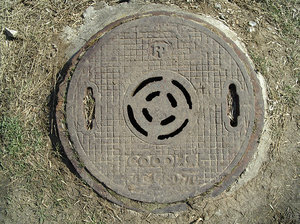 old rusty shaft lid