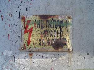 grunge high-voltage sign