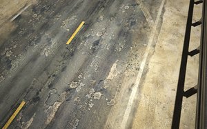 damaged asphalt road max