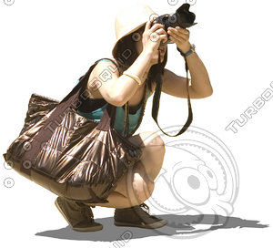 Woman tourist photographer squatting