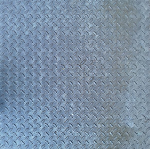 Ribbed metal plate